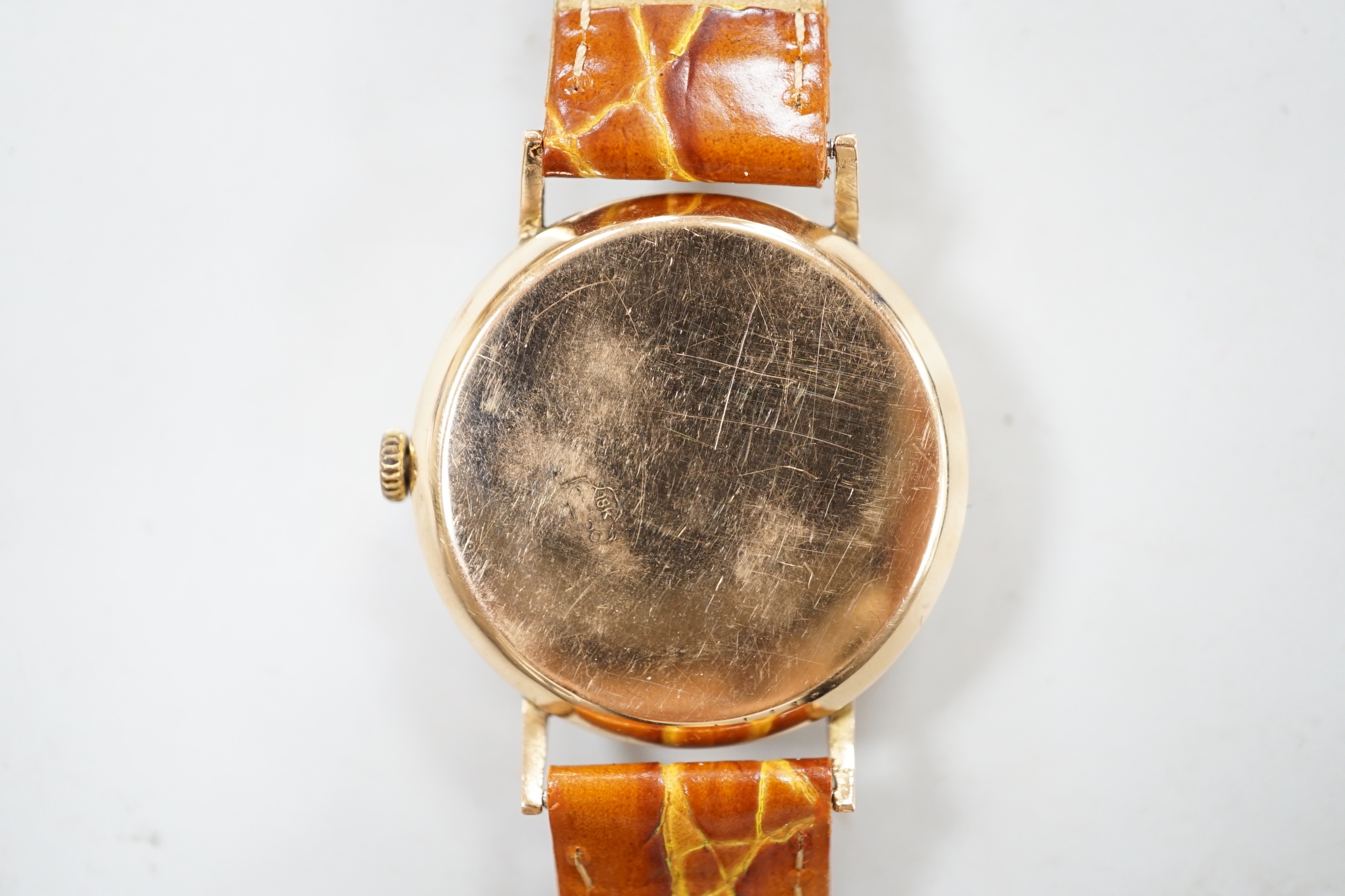 A gentleman's 1960's yellow metal Omega automatic wrist watch, movement c.552, on later associated strap, cased diameter 32mm, no box or papers.